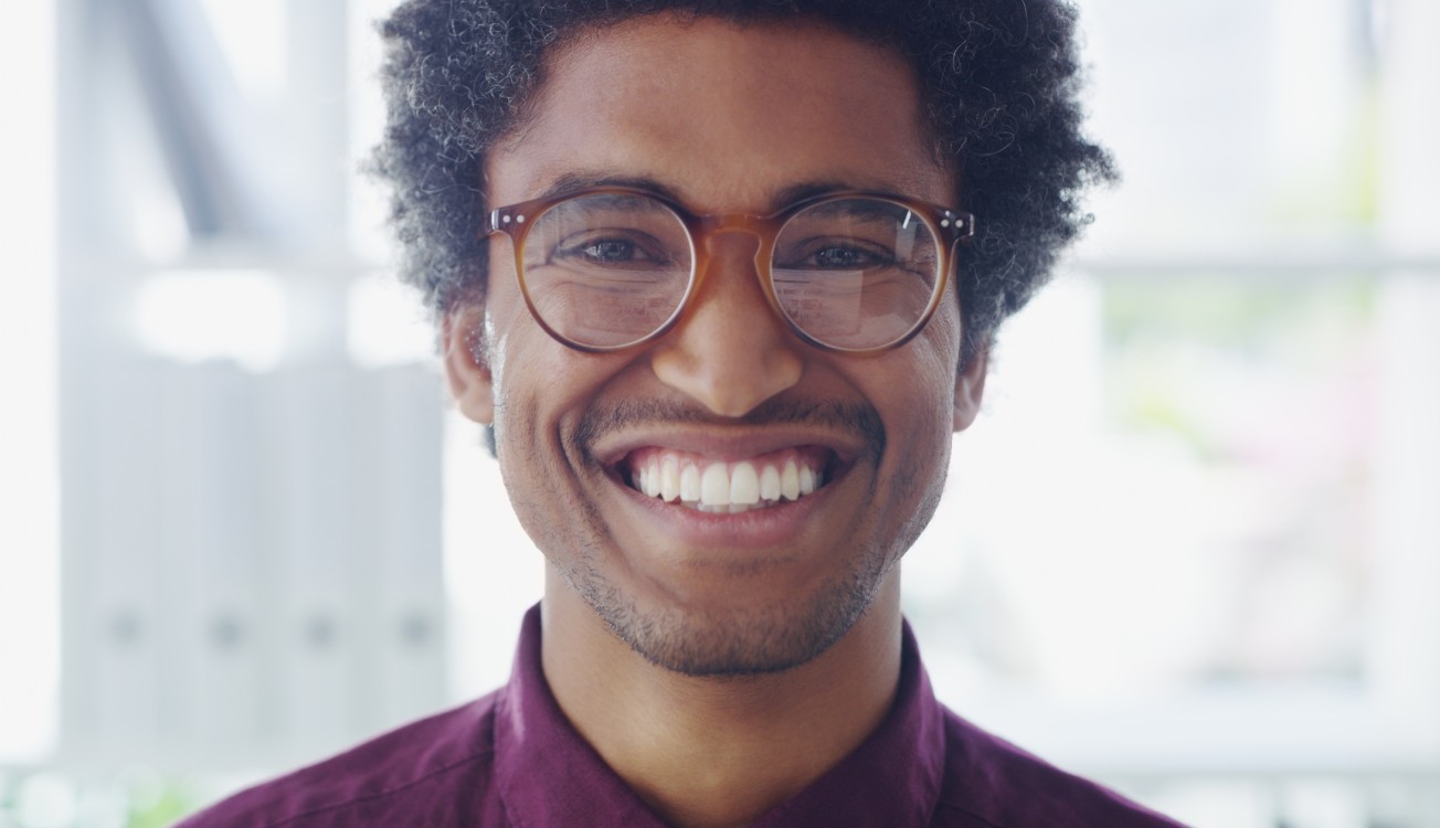 Happy employee consultant young man glasses